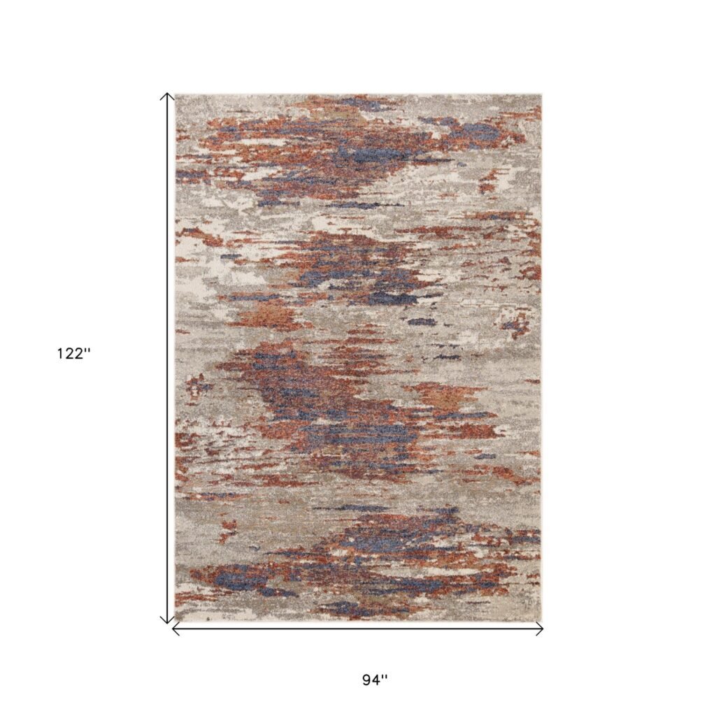 8′ X 10′ Beige Rust and Blue Abstract Power Loom Area Rug