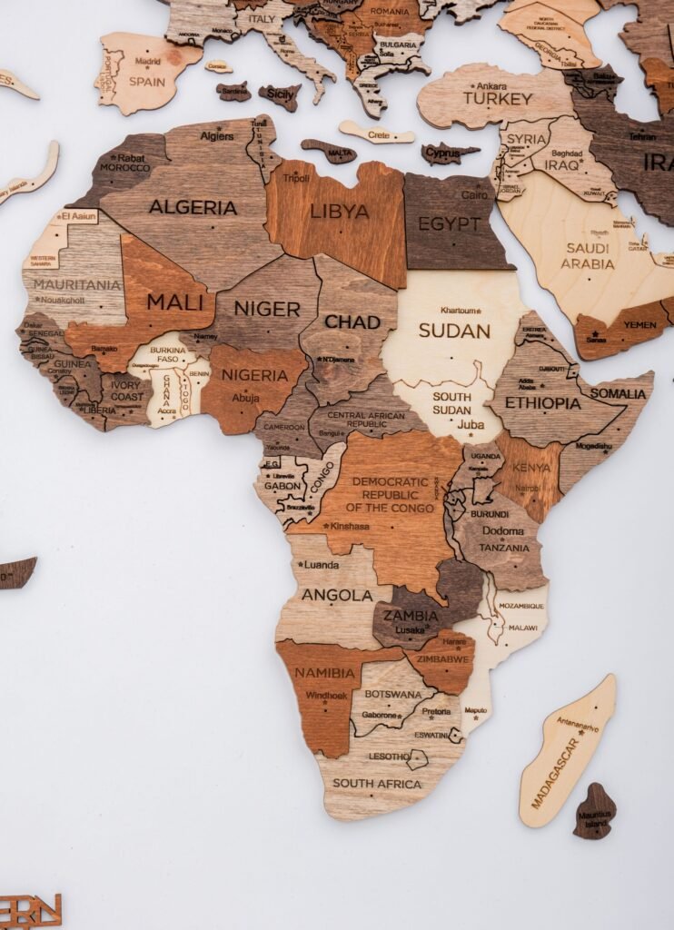 24″ X 39″ Brown and Beige Wood World Map Hanging Dimensional Sculpture