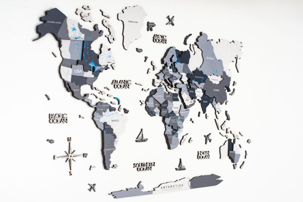 24″ X 39″ Black Gray and White Wood World Map Hanging Dimensional Sculpture