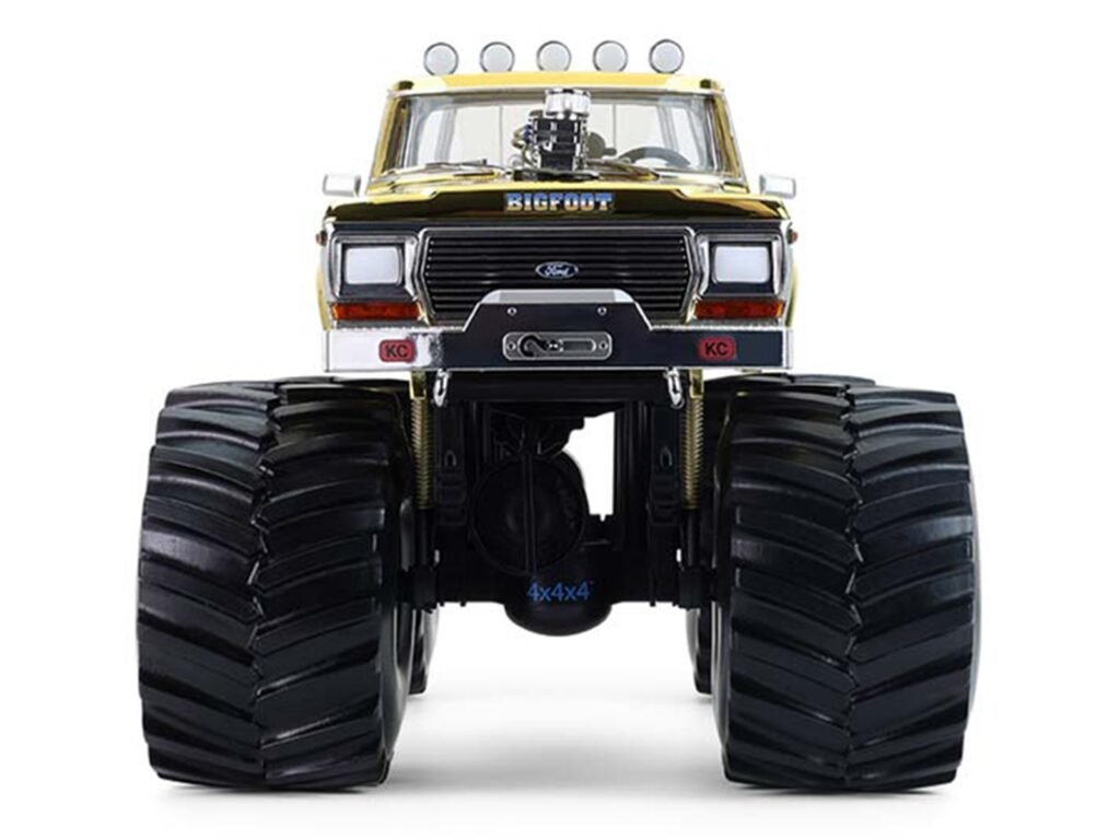 1979 Ford F-250 Monster Truck “Bigfoot #1 50th Anniversary” Gold Chrome with Bob Chandler Standing Figure “Kings of Crunch” Series 1/18 Diecast Model Car by Greenlight