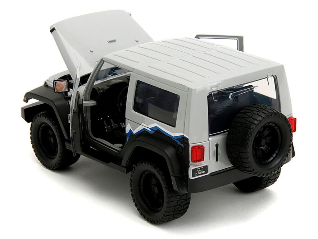 2007 Jeep Wrangler Gray and Black with Blue and White Stripes with Extra Wheels “Just Trucks” Series 1/24 Diecast Model Car by Jada