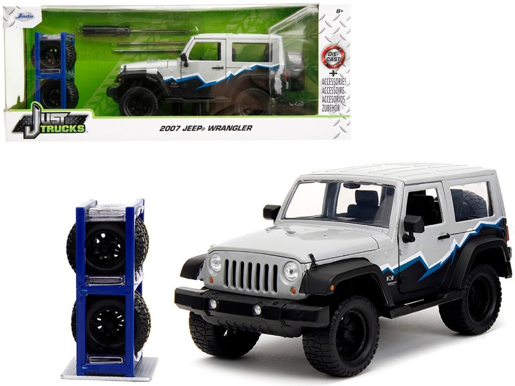 2007 Jeep Wrangler Gray and Black with Blue and White Stripes with Extra Wheels “Just Trucks” Series 1/24 Diecast Model Car by Jada