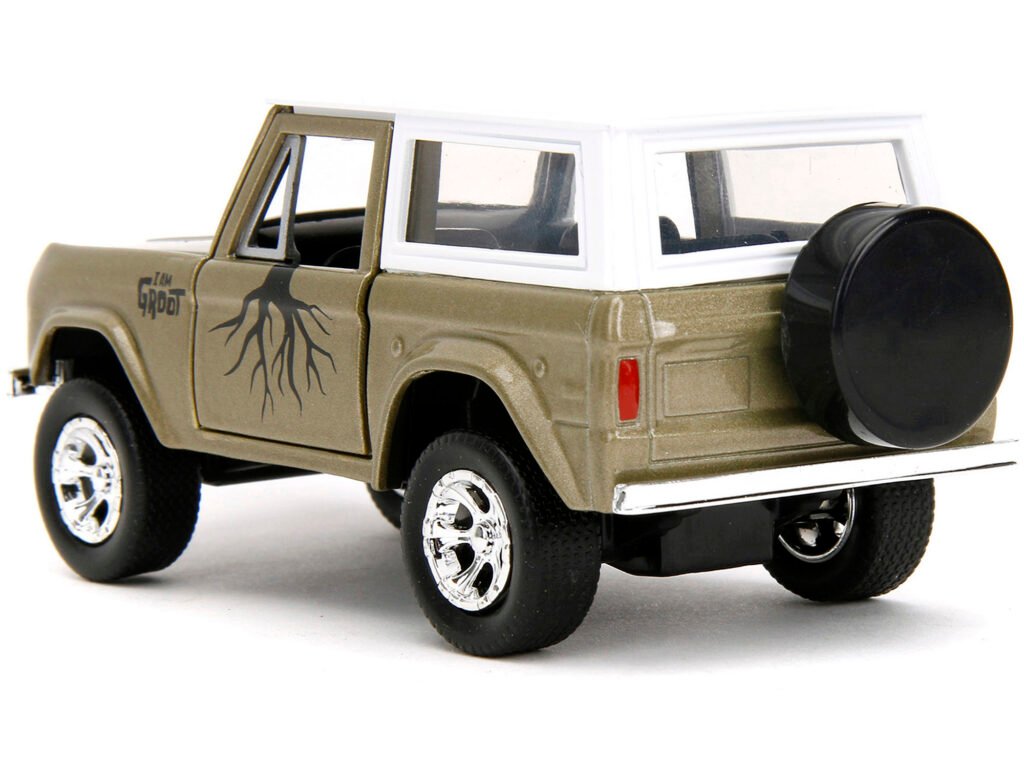 1973 Ford Bronco Gold Metallic with White Top and Groot Diecast Figure “Guardians of the Galaxy” “Marvel” Series 1/32 Diecast Model Car by Jada