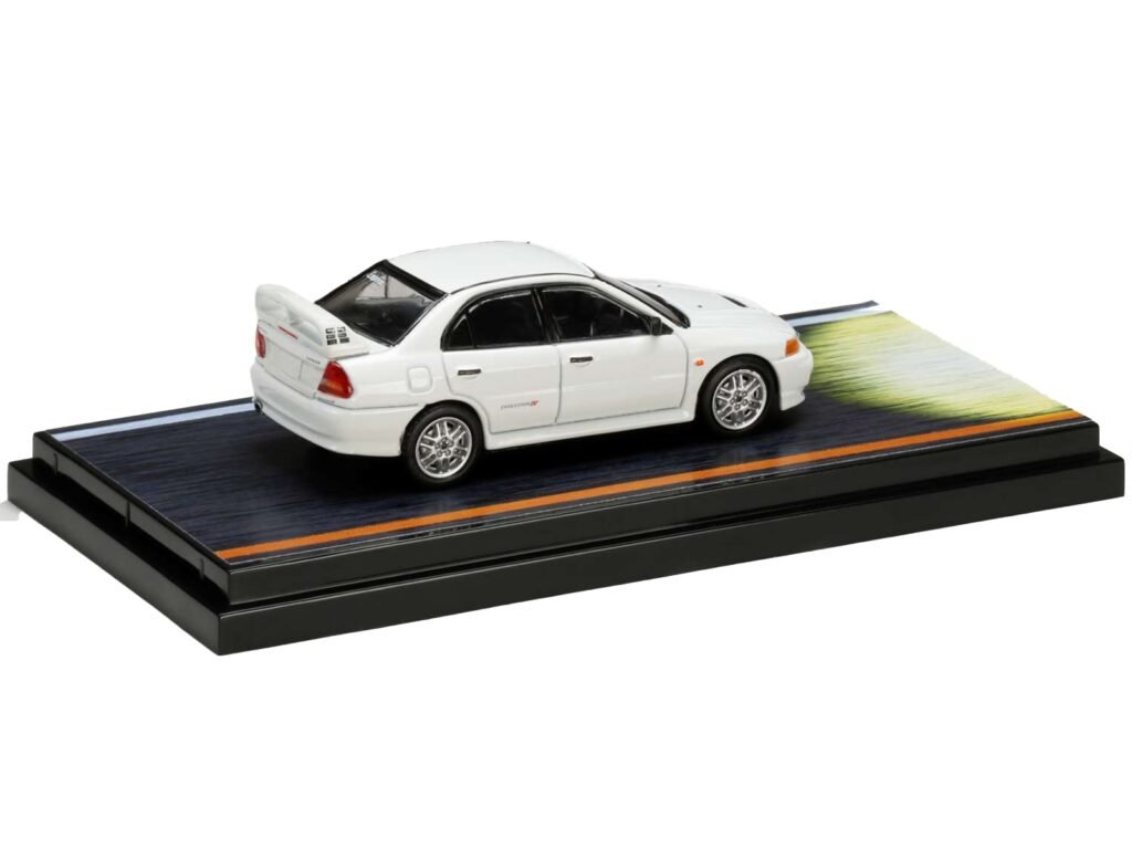 Mitsubishi Lancer RS Evolution IV RHD (Right Hand Drive) White “Monstar” with Seiji Iwaki Driver Figure “Initial D” (1995-2013) Manga 1/64 Diecast Model Car by Hobby Japan